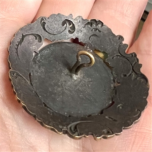 Large brass button with enamel center of verbal around French shield and crown.