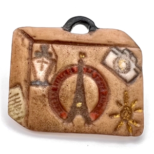 Ceramic studio button of a travel bag - favor button for FSBS 2011.