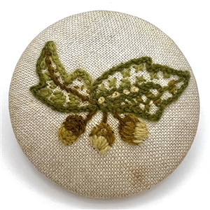 Huge embroidered studio button of leaves and berries by Patricia Hurlin. 