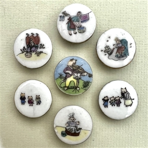 Seven porcelain nursery rhyme buttons by Lois Calkins. 