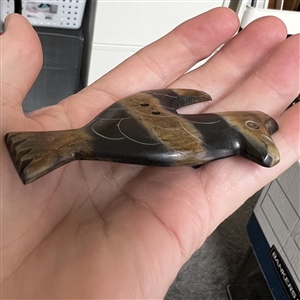 HUGE carved button of a stylized bird.