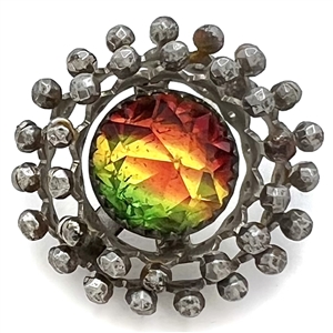 Very unusual multi-colored flashed glass set in metal “wheels" button.