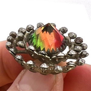 Very unusual multi-colored flashed glass set in metal “wheels button.