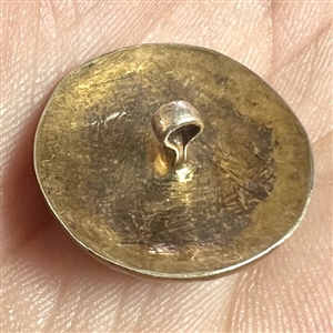 Champlevé “crystalenamel button with gilded back.