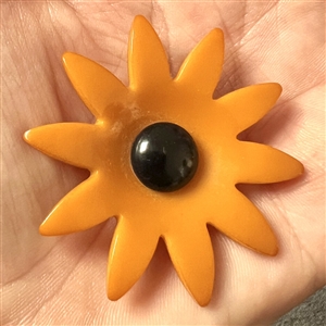 Vintage Bakelite realistic flower button.