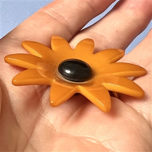 Vintage Bakelite realistic flower button.