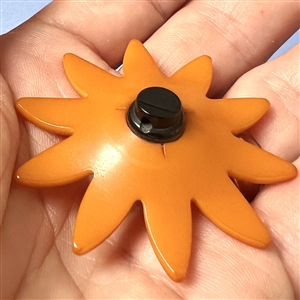 Vintage Bakelite realistic flower button.