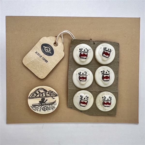 Seven natural material Inuit buttons including a kayaker and a set of six roaring polar bears.