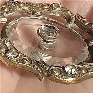 Lovely Div I. faceted clear glass in metal button with paste pin shank.