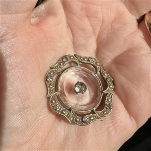 Lovely Div I. faceted clear glass in metal button with paste pin shank.