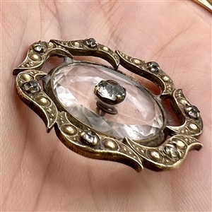 Lovely Div I. faceted clear glass in metal button with paste pin shank.