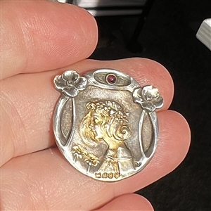 Stunning Art Nouveau Hallmarked silver button of a woman with flowers. 