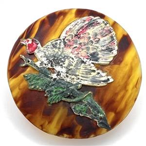 Huge tortoise shell (?) button with enamel turkey.