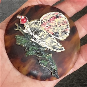 Huge tortoise shell (?) button with enamel turkey.
