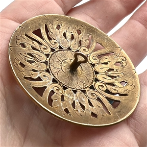Extra large brass button with oval faceted  glass imitation gem.