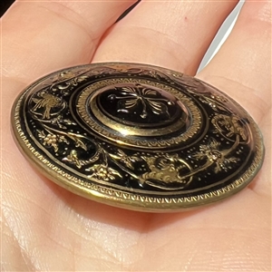 Large damascene button with great border of birds and flowers.