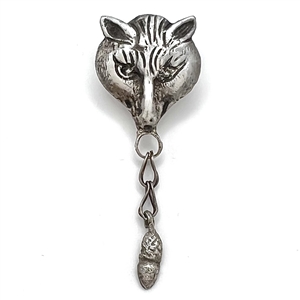 White metal button of a fox head with movable acorn.