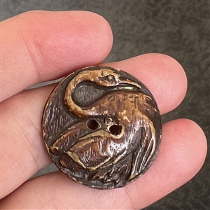 Burwood swan sew-thru button. 