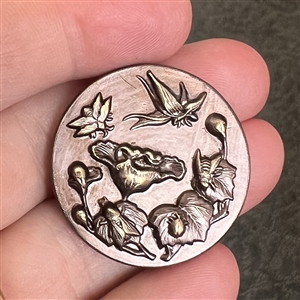 Dark lavender tinted metal button of five insects.