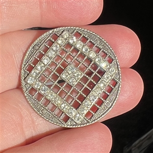 Metal button with pastes of “squares in square design.