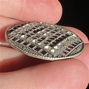 Metal button with pastes of “squares in square design.