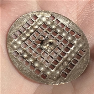 Metal button with pastes of “squares in square design.