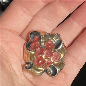French couture ceramic button of flowers and bow designed by Roger Jean-Pierre for Schiaparelli.