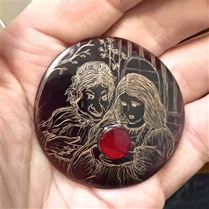 Large Nancy DuBois pina shell studio button of “Snow White takes the Apple.