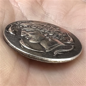UNIQUE two sided white metal button.