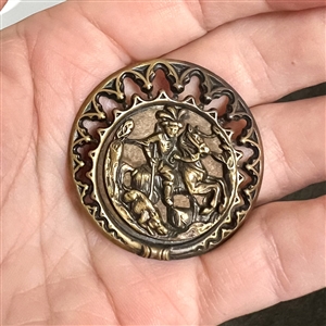 “Boar Hunter Brass button with wood background.