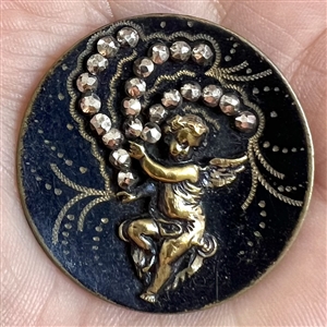 Brass button of “Winged Creature.