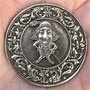 French silvered metal button of a gnome.