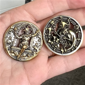 Two brass buttons of Rigoletto the Jester.