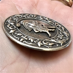French silvered metal button of a gnome.
