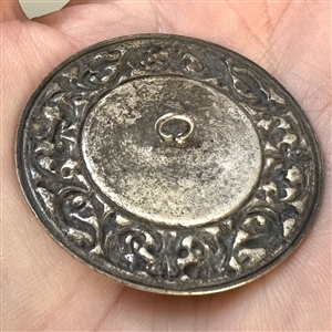 French silvered metal button of a gnome.