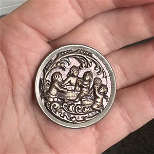 “Playland Wash Day brass button.