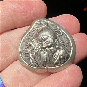 Chinese silver button of a God or old man.