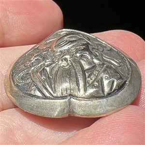 Chinese silver button of a God or old man.