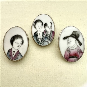 Three shard ceramic buttons of Asian men and women. 
