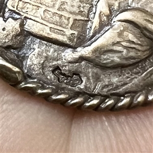 Hallmarked silver button of “Christ and the woman of Sameria.