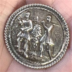 Dutch silver button of men carrying grapes.