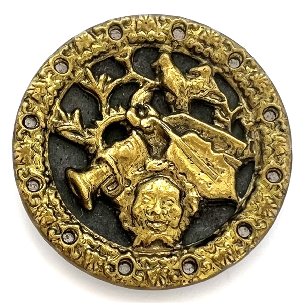 Brass button of mans head with many objects around him.