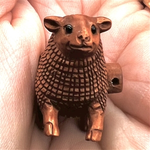 Carved boxwood realistic sheep.