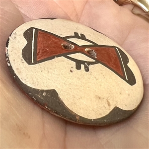 Zia pueblo ceramic pottery button with geometric pattern.
