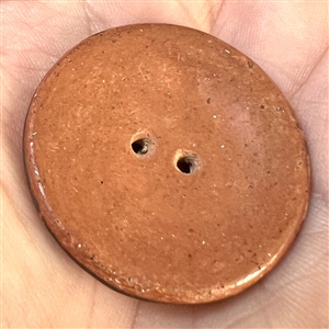 Zia pueblo ceramic pottery button with geometric pattern.