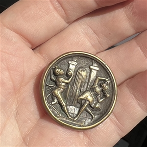 Unusual brass stud of monkey's dancing.