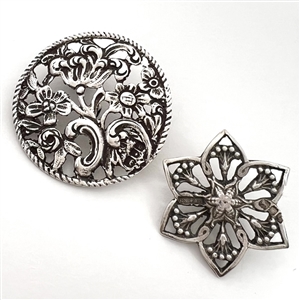 Two silver with openwork buttons of flowers.