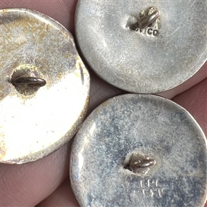 Three Mother of pearl and abalone inlay in Mexican silver buttons of flowers.