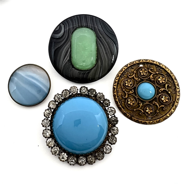 Four imitation gemstone glass in metal buttons. 