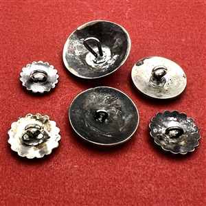 Six modern Native American silver buttons with assorted images.